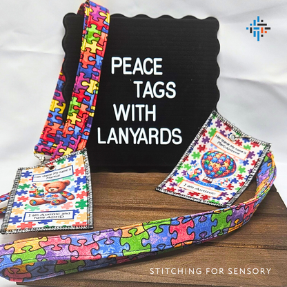 Handmade Peace Tags™ with autism puzzle piece lanyards displayed on a board – safe ID tags for children and adults by Stitching for Sensory.